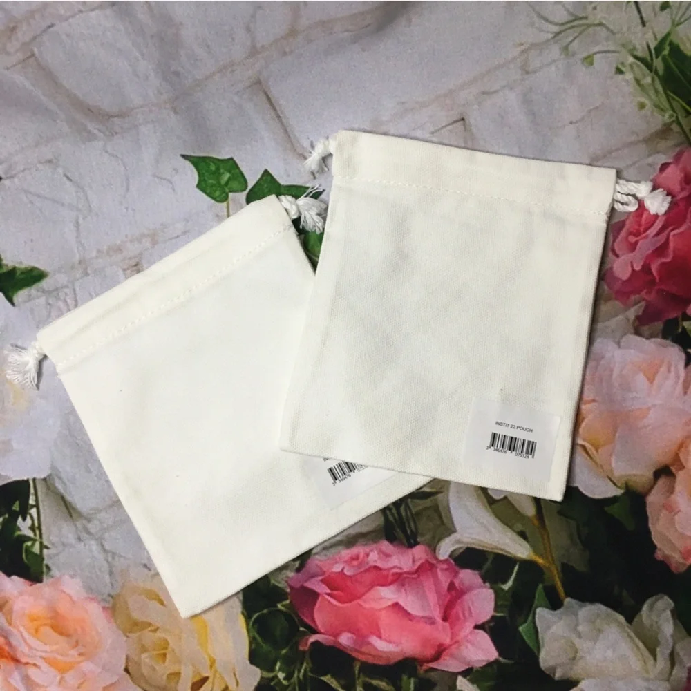TWO (2) Guerlain mini small white drawstring dustbag new approx 5” x 5”